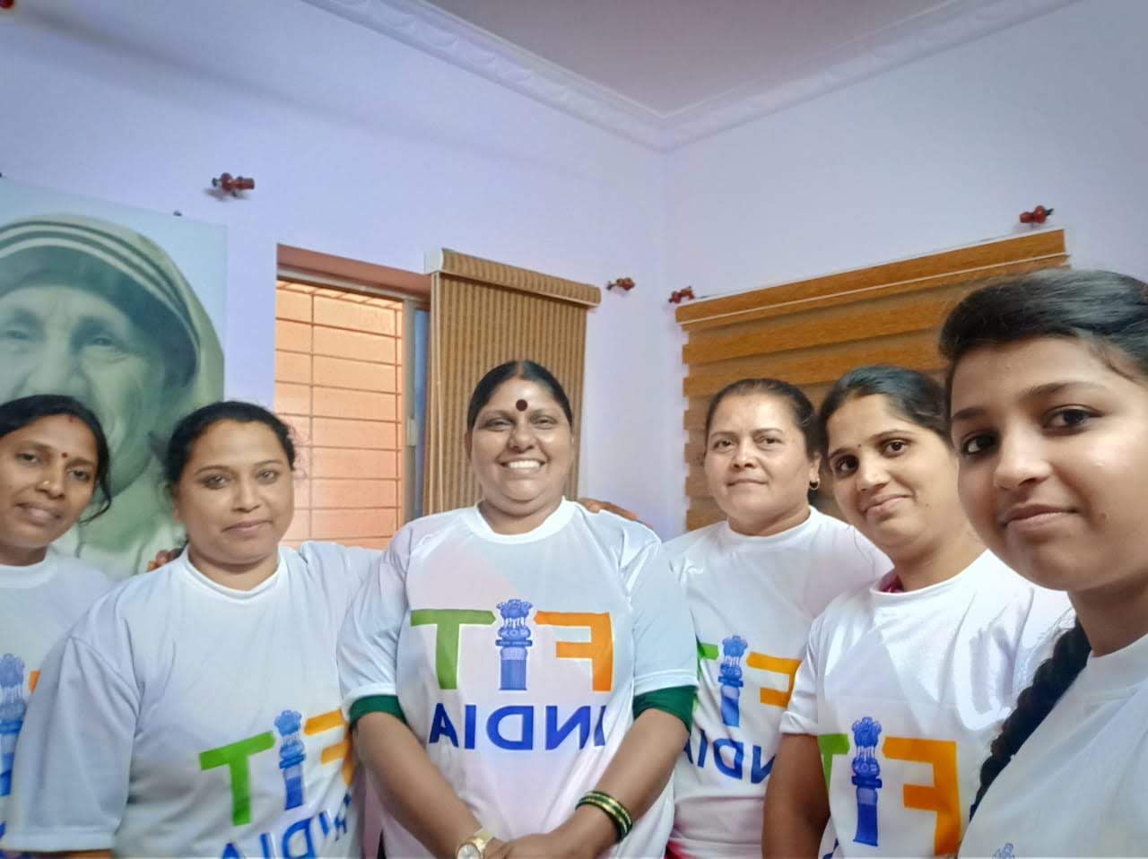 Safiena Joseph with volunteers wearing Fit India T-shirts